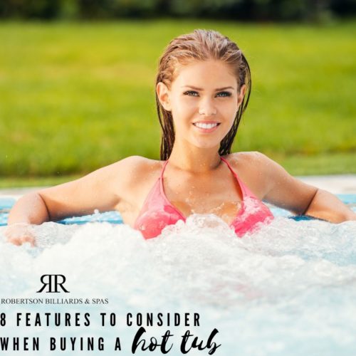 Woman relaxing in a classic hot tub